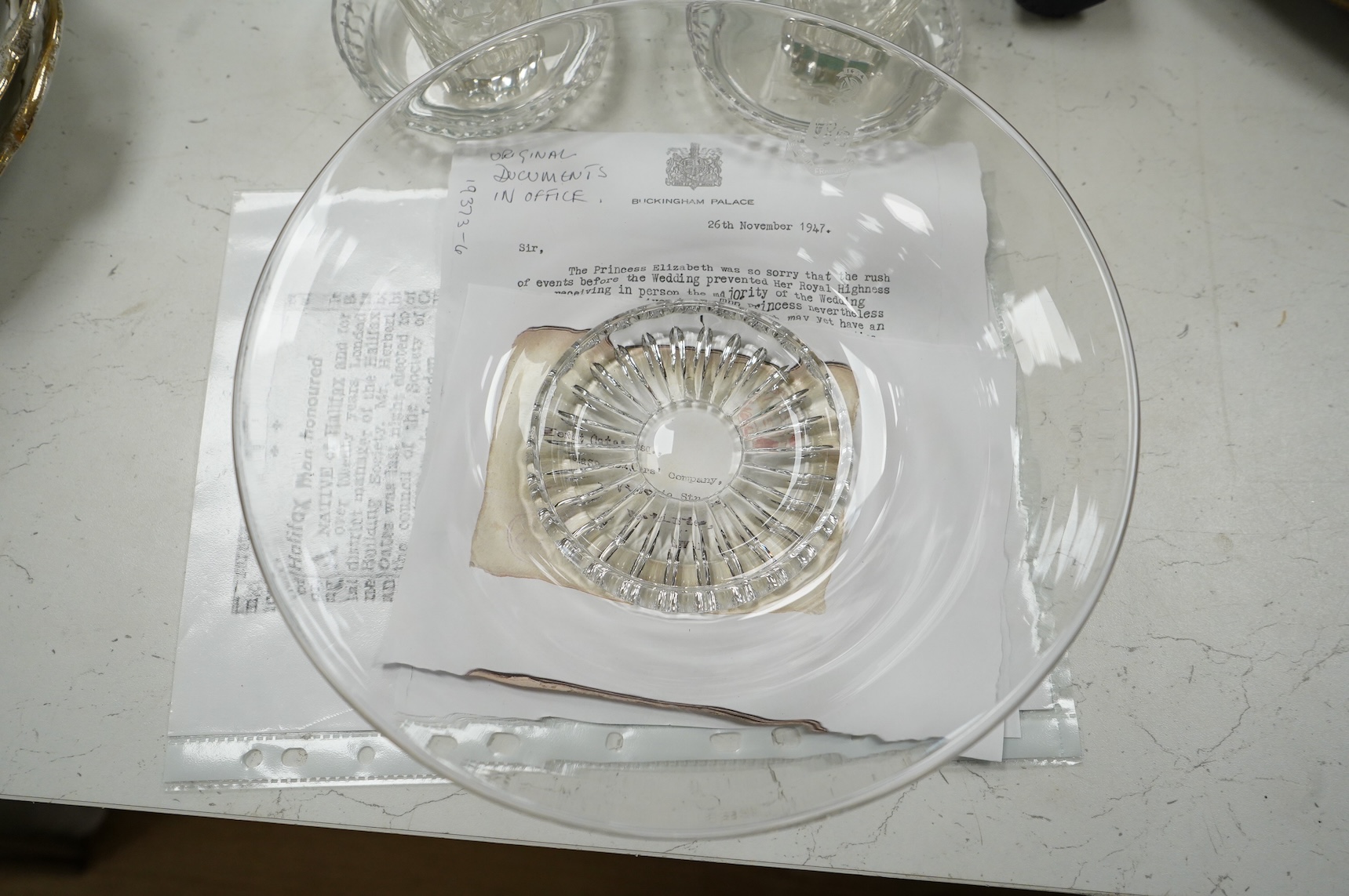 A collection of glass from the company of glass sellers. Including a replica of a gift given to Elizabeth II as a wedding gift, with a letter from the palace.